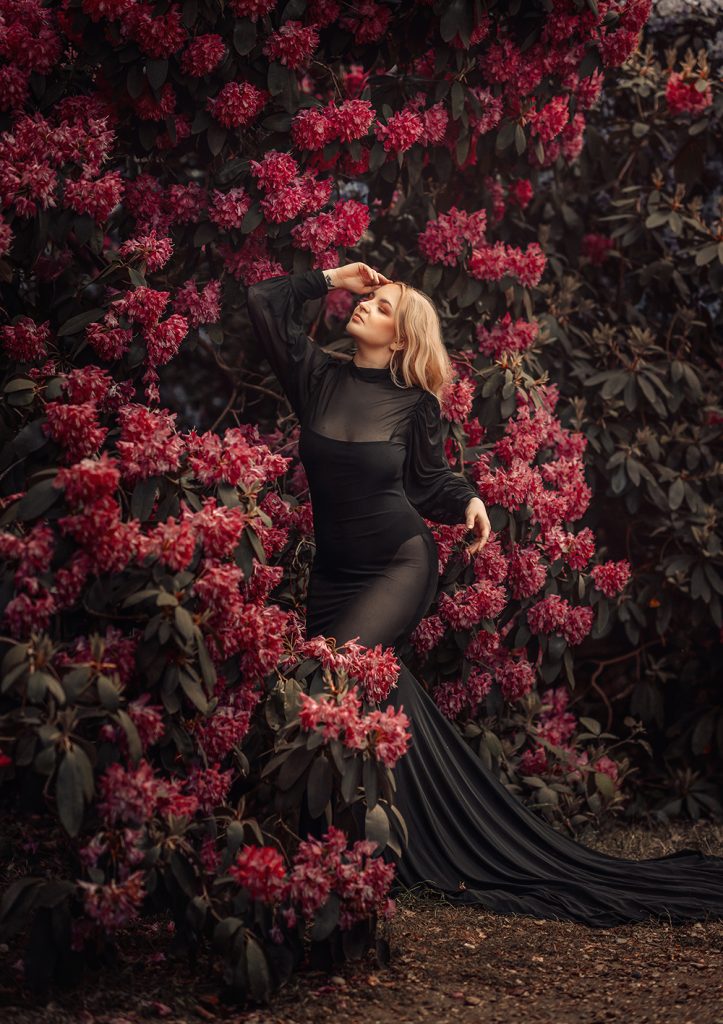 women photoshoot in nature park surrounded by blooming flowers creative outdoor portrait photoshoot in Sutton Surrey and South London