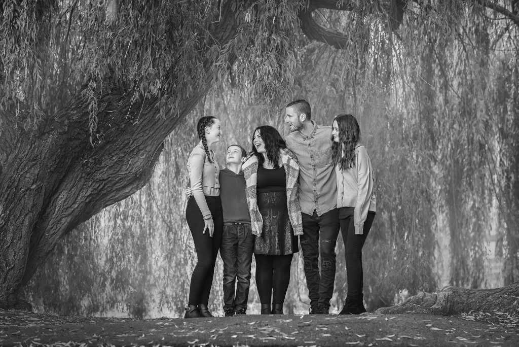 family happy moment casual photography natural pose smiling at Beddington Park Wallington, Sutton London photographer